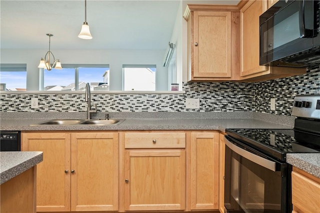 kitchen featuring a sink, light brown cabinetry, tasteful backsplash, and black appliances