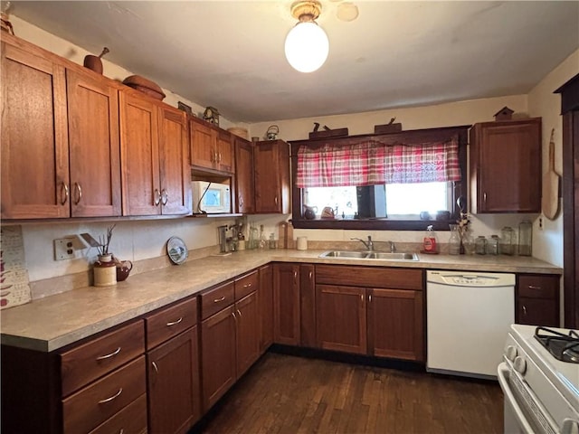 2384 State Highway 205, Laurens, NY 13810 - kitchen featuring a sink, light countertops, white appliances, and dark wood-style floors