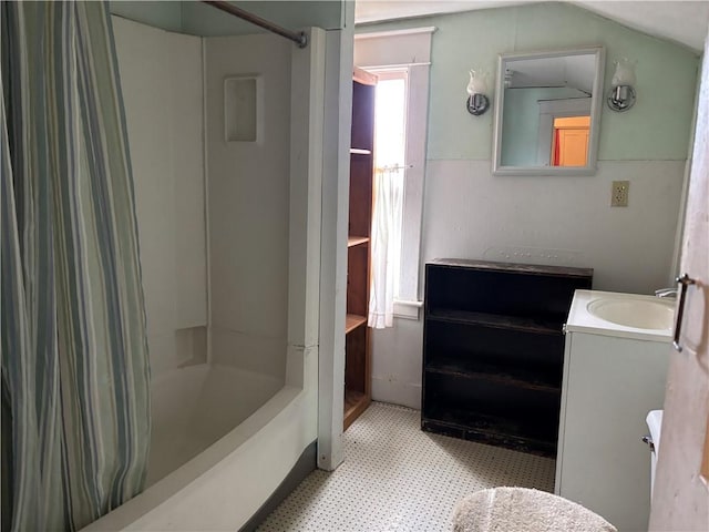 2384 State Highway 205, Laurens, NY 13810 - bathroom with tile patterned floors, shower / bath combo, lofted ceiling, and vanity