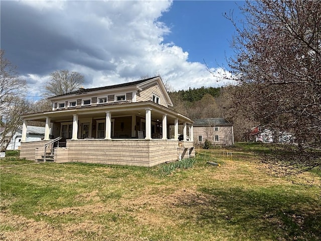 2384 State Highway 205, Laurens, NY 13810 - view of front of property featuring covered porch and a front yard