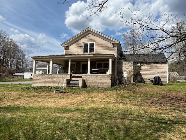 2384 State Highway 205, Laurens, NY 13810 - view of front of house with a porch and a front lawn