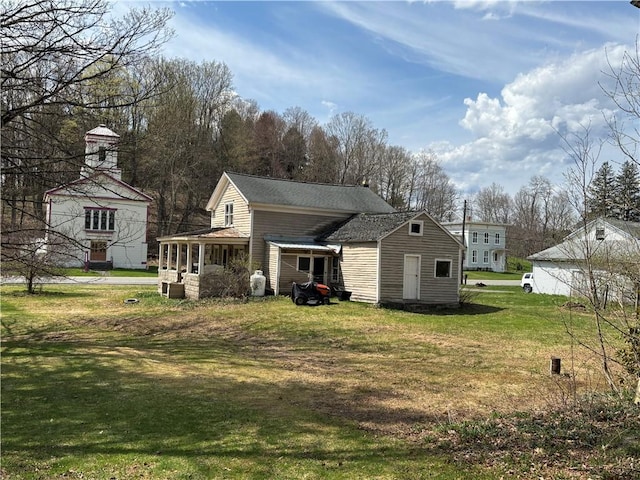2384 State Highway 205, Laurens, NY 13810 - back of property with a yard and central AC