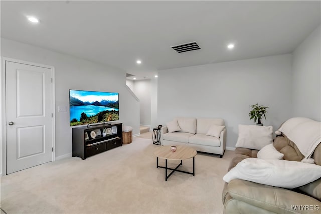 living room with visible vents, carpet flooring, baseboards, and recessed lighting