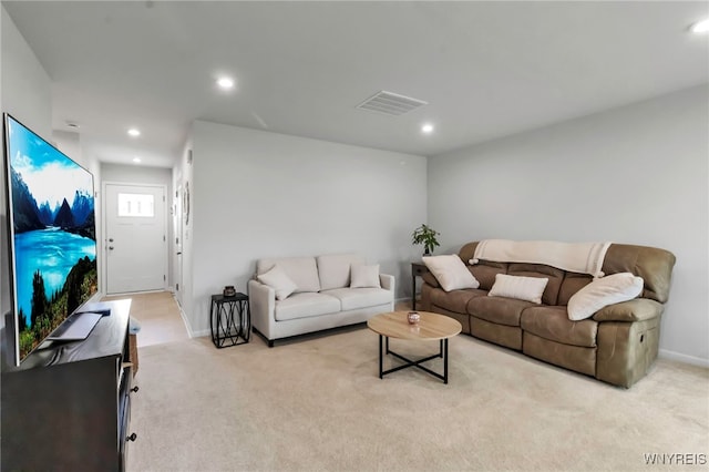 living room with baseboards, visible vents, recessed lighting, and light colored carpet