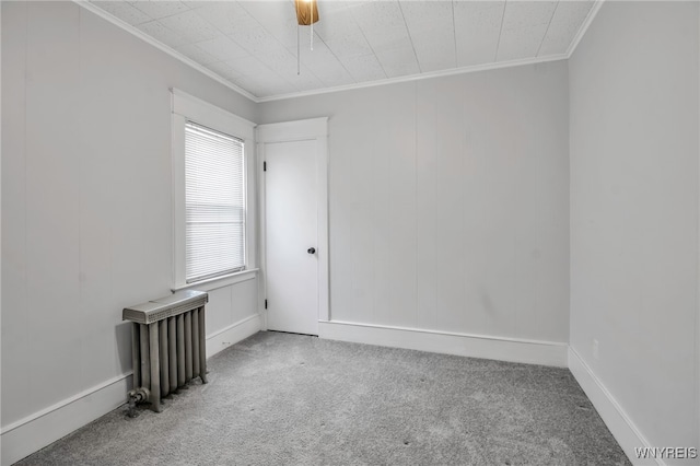 92 Carlyle Ave, Buffalo, NY 14220 - carpeted spare room featuring radiator heating unit and crown molding