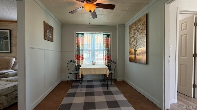 dining area with a ceiling fan