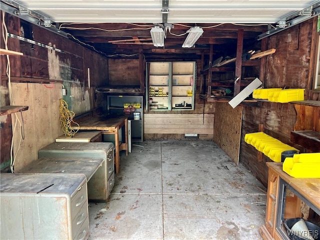 garage with wood walls