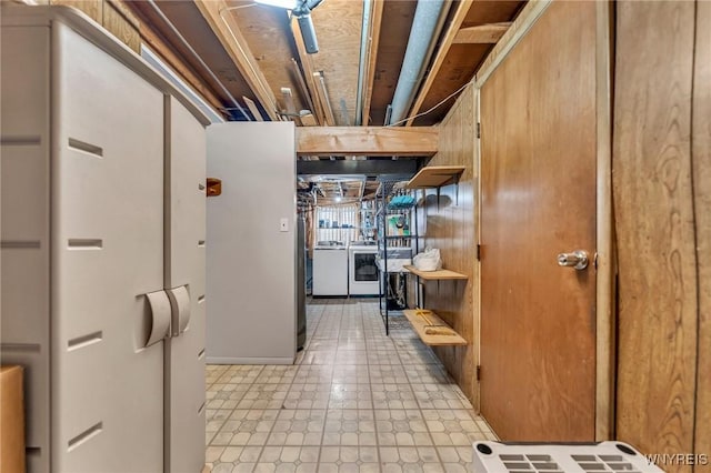interior space with washing machine and clothes dryer