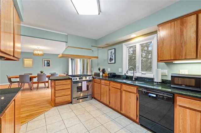 kitchen with stainless steel range with gas stovetop, a sink, a peninsula, black dishwasher, and light tile patterned flooring