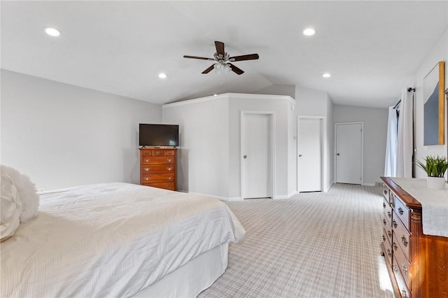 bedroom with recessed lighting, baseboards, light carpet, and lofted ceiling