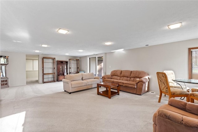 living room with light colored carpet