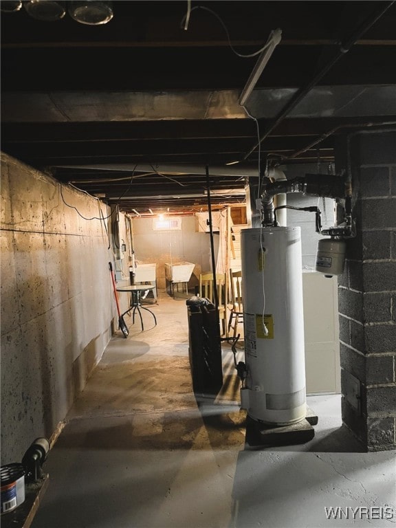 1266 91st St, Niagara Falls, NY 14304 - unfinished basement with gas water heater and a sink