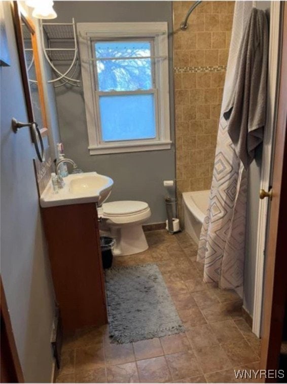 1266 91st St, Niagara Falls, NY 14304 - full bath featuring vanity, toilet, and shower / bath combination with curtain