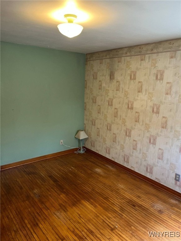 1266 91st St, Niagara Falls, NY 14304 - spare room with hardwood / wood-style floors and baseboards