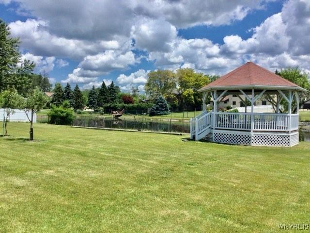 view of yard with a gazebo and fence