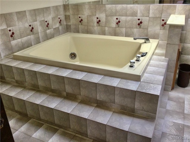 full bath with a garden tub