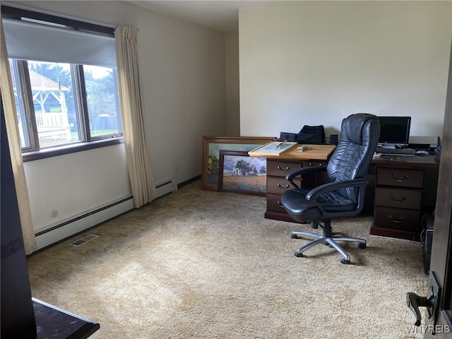 carpeted office space featuring baseboard heating and visible vents