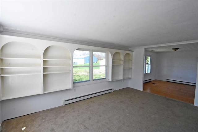 unfurnished living room with crown molding, carpet flooring, a baseboard heating unit, and baseboard heating