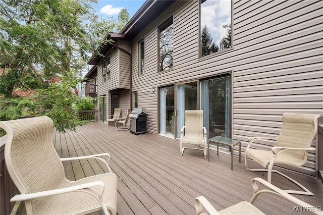 wooden deck with grilling area