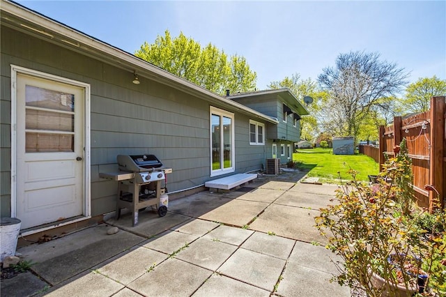 view of patio / terrace with fence and grilling area