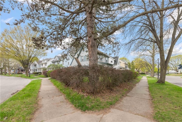 view of side of home with a residential view