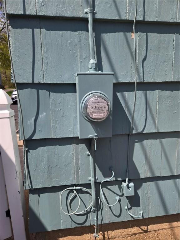 exterior details featuring electric meter