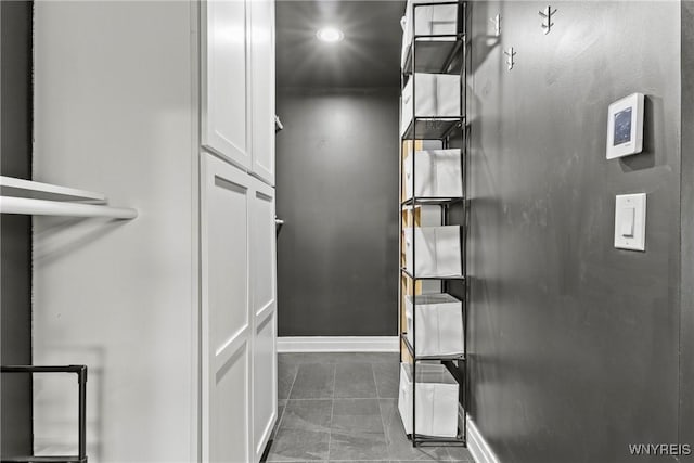bathroom featuring recessed lighting and baseboards