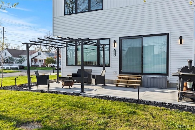 view of patio / terrace featuring an outdoor fire pit, a pergola, area for grilling, and entry steps