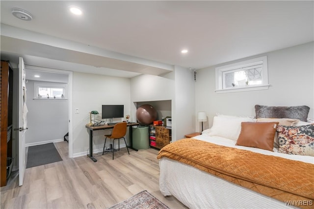 bedroom with recessed lighting, baseboards, and light wood-style floors