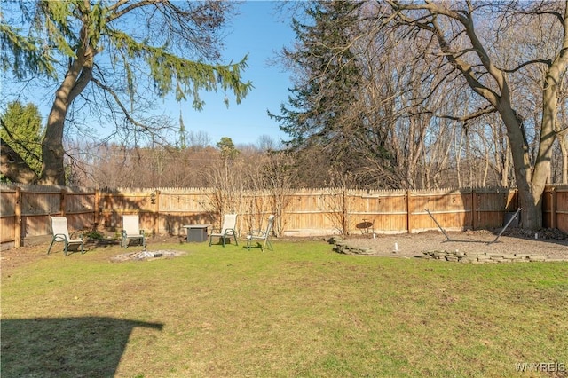 view of yard with a fenced backyard