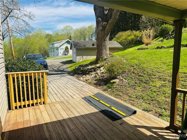 deck featuring a lawn