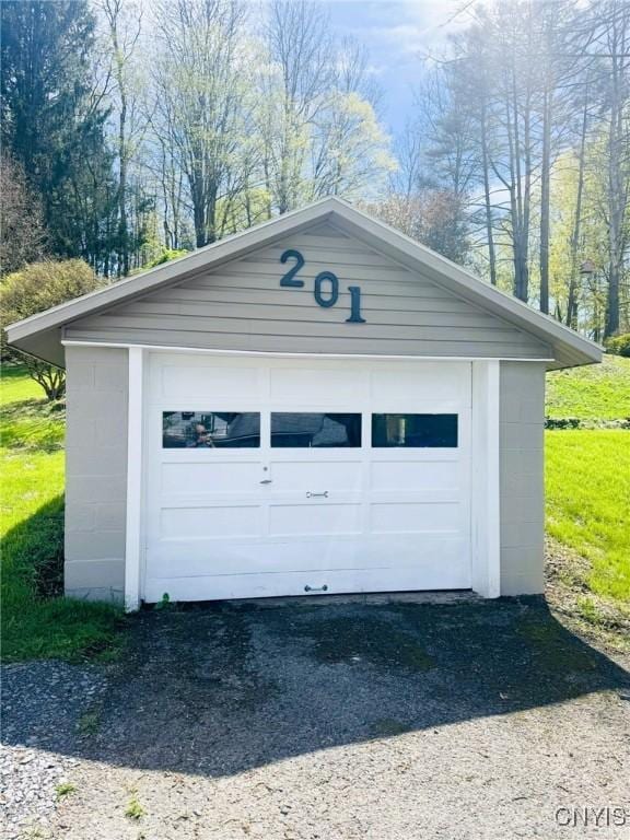 detached garage with driveway