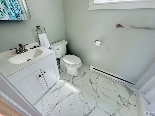 bathroom featuring vanity, toilet, and marble finish floor
