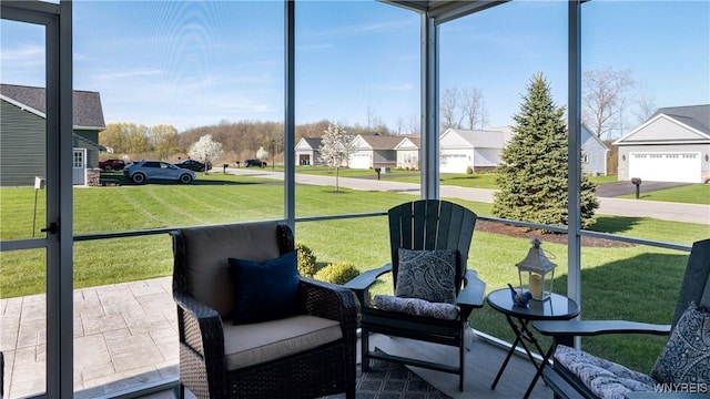 sunroom with a residential view