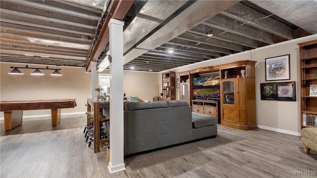 living room with baseboards, billiards, and wood finished floors