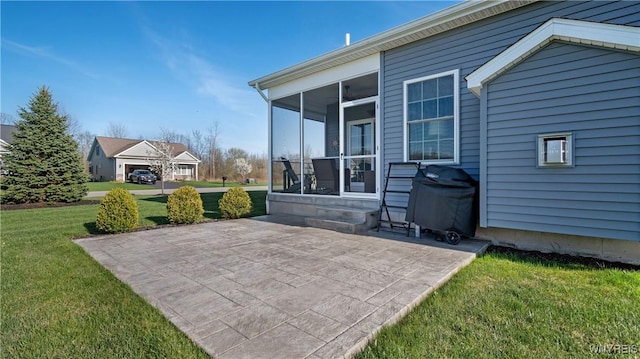 view of patio featuring a sunroom and grilling area