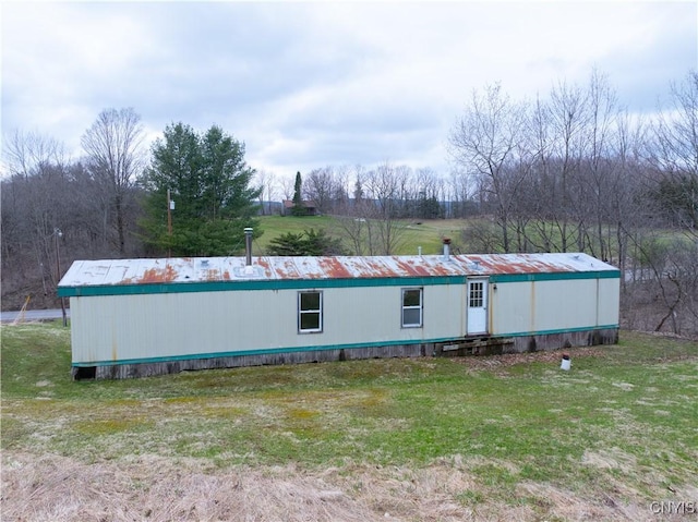 364 W End Rd, Fairfield, NY 13365 - rear view of house with a yard