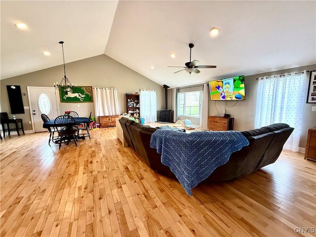28053 Boat Launch Rd, Lyme, NY 13622 - living room featuring light wood-style flooring, ceiling fan, and vaulted ceiling
