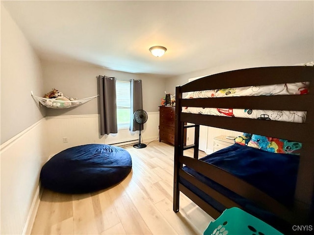 28053 Boat Launch Rd, Lyme, NY 13622 - bedroom featuring wood finished floors