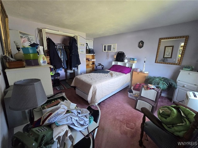 carpeted bedroom featuring a closet