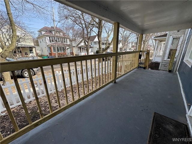 balcony with a porch and a residential view