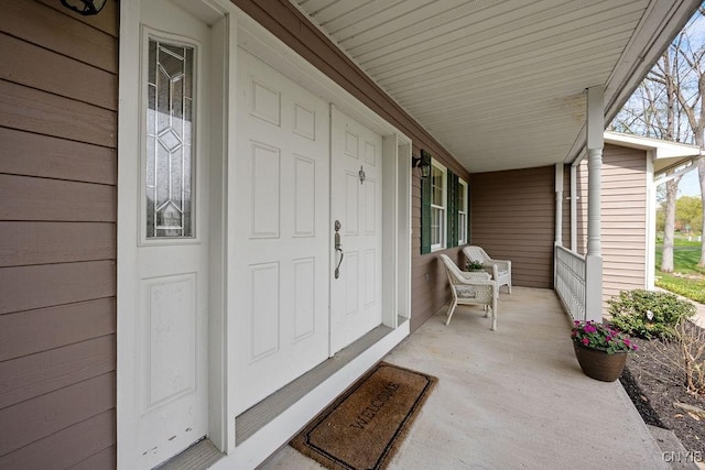 entrance to property with a porch