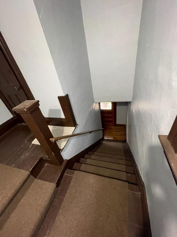 staircase with baseboards