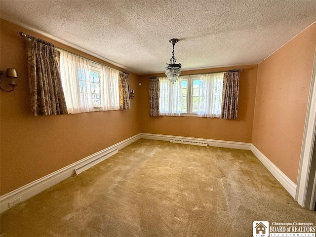 148 Myrtle St, Jamestown, NY 14701 - unfurnished dining area with a textured ceiling, baseboards, visible vents, and carpet