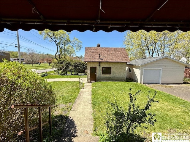 148 Myrtle St, Jamestown, NY 14701 - view of front of property featuring aphalt driveway, an outdoor structure, roof with shingles, and a front lawn