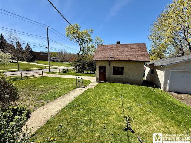 148 Myrtle St, Jamestown, NY 14701 - view of side of home featuring fence, a shingled roof, an outbuilding, a chimney, and a yard