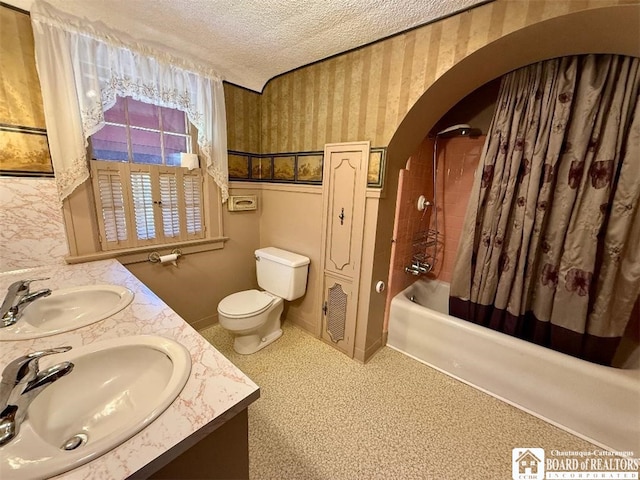 148 Myrtle St, Jamestown, NY 14701 - bathroom featuring double vanity, a textured ceiling, a sink, and shower / bath combo