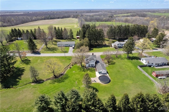 birds eye view of property featuring a rural view