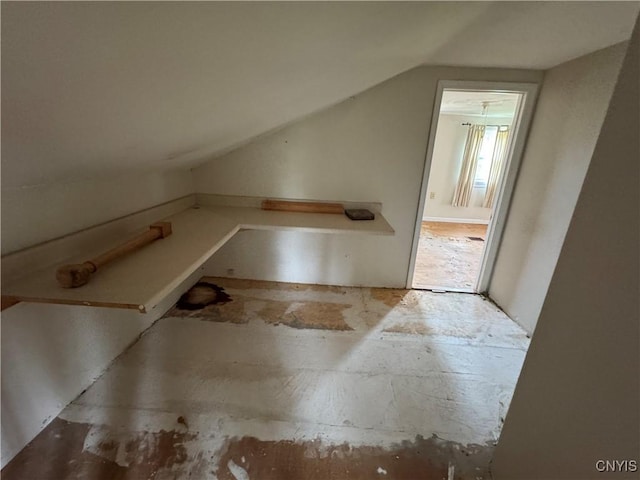 bonus room with vaulted ceiling