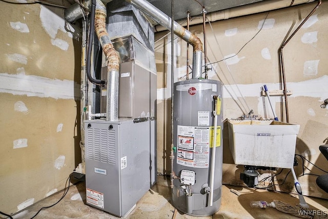 utility room with heating unit, a sink, and water heater